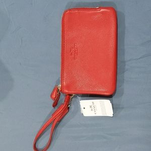 Small, red Coach wristlet